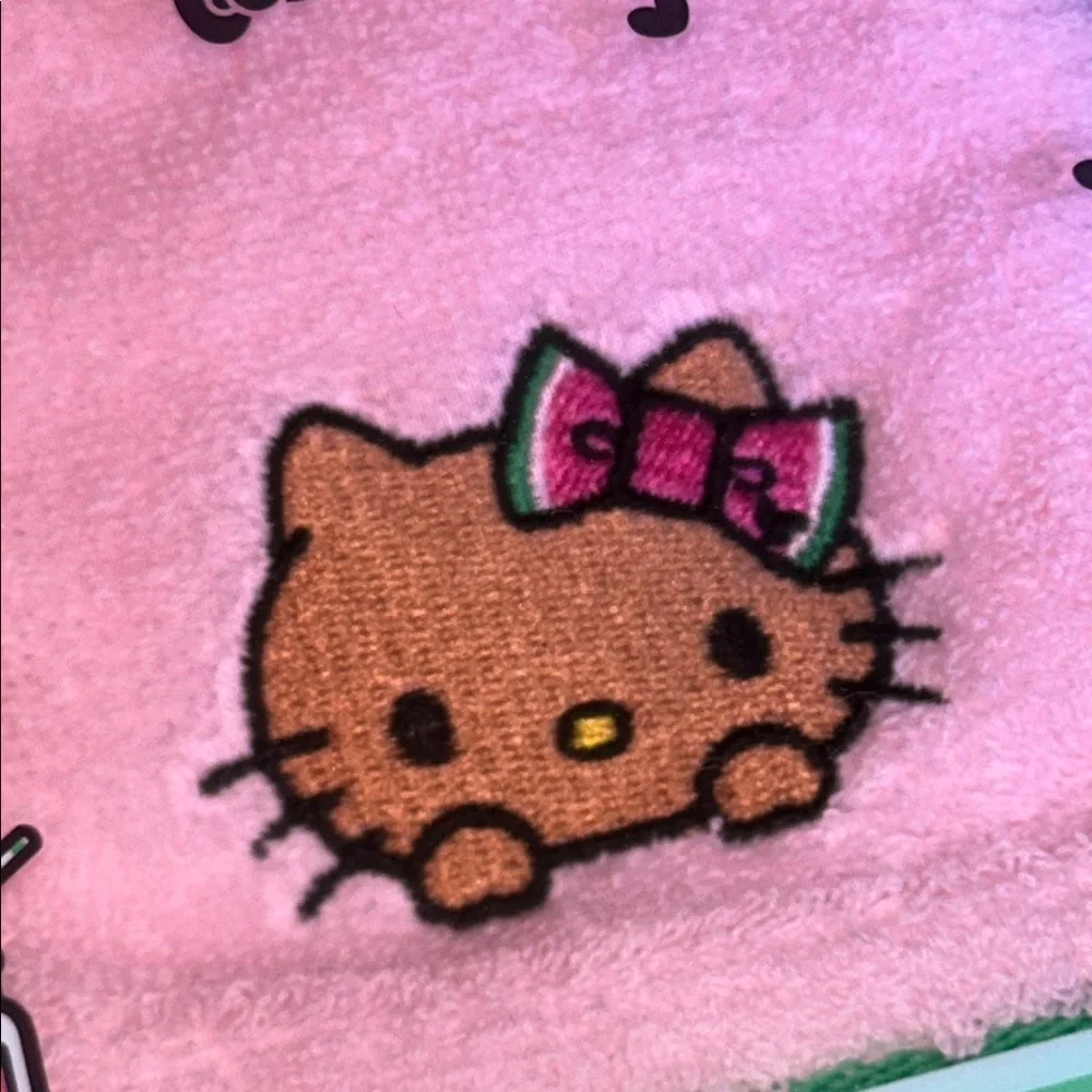 Hello Kitty Pink Towel with Green Trim